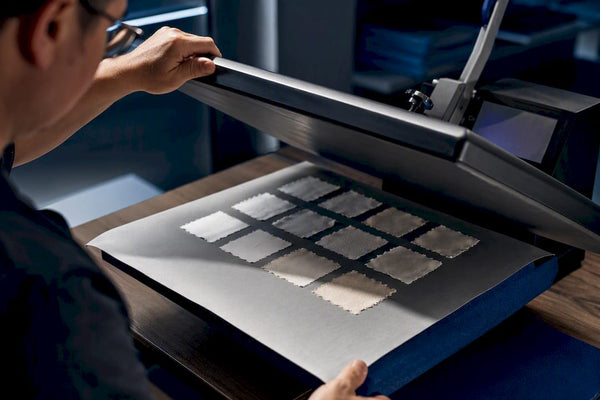 DTF swatches being tested under heat press